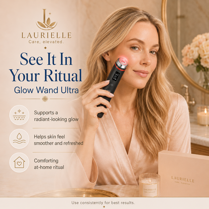 A woman in a satin robe holds a Laurielle Glow Wand Ultra beauty device against her cheek in a warm bathroom setting. The image includes product text, icons, and a branded box and candle, promoting a skincare ritual.